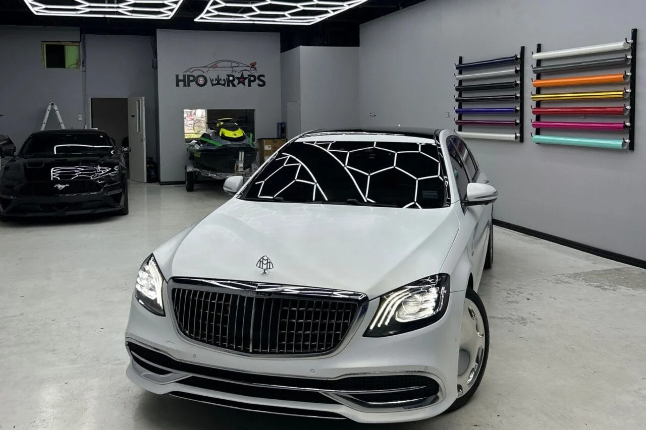 White Mercedes-Maybach with custom roof design