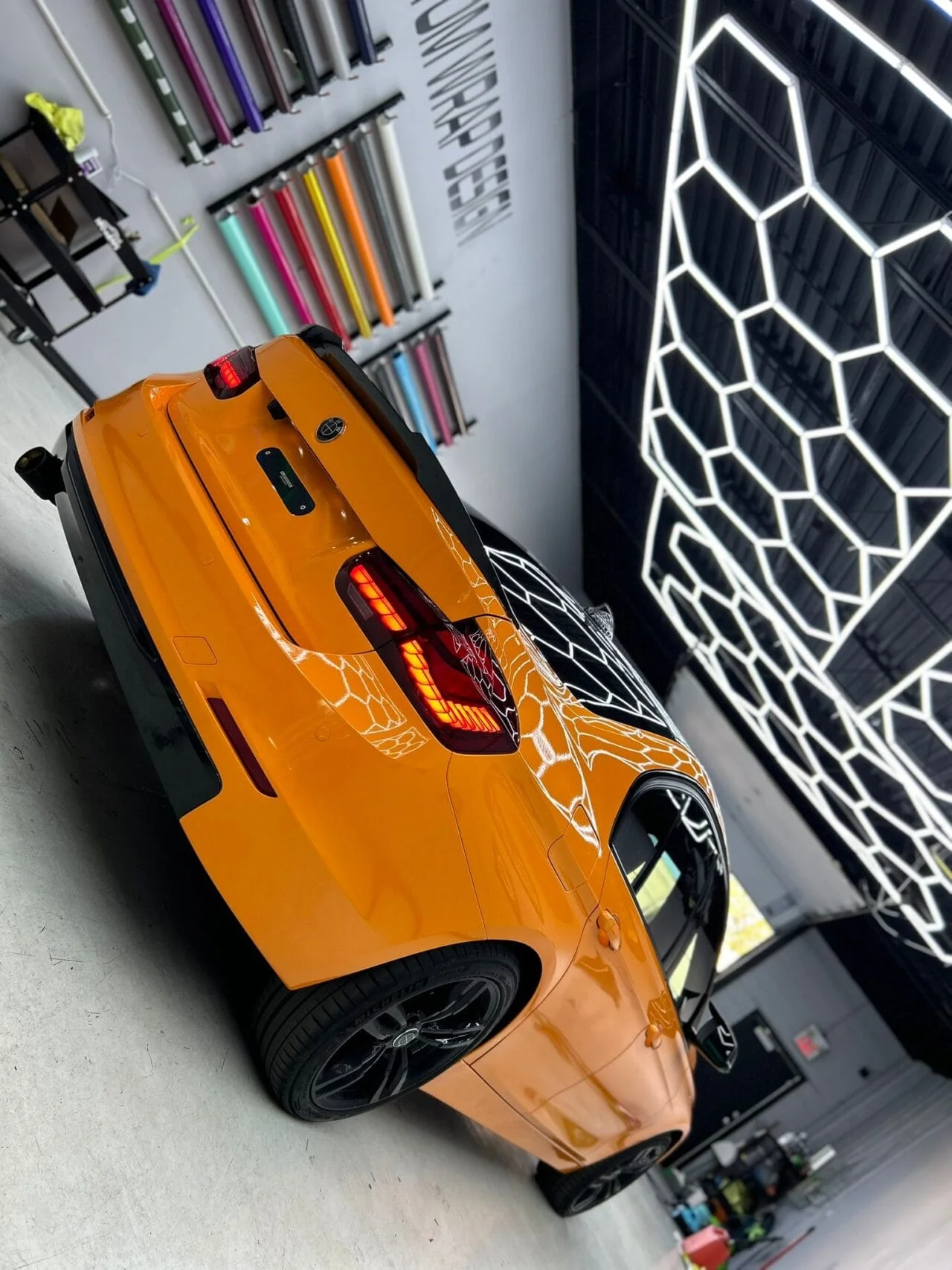 Orange sports car with custom wrap
